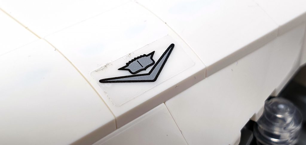 showing the transparent sticker for the Cadillac logo on the front